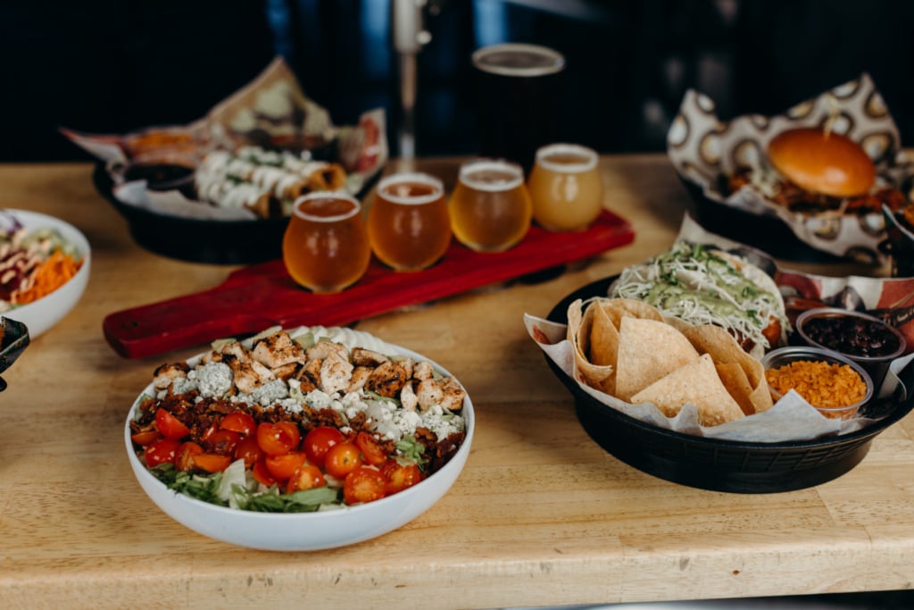 Brews Hall assortment of food and beer