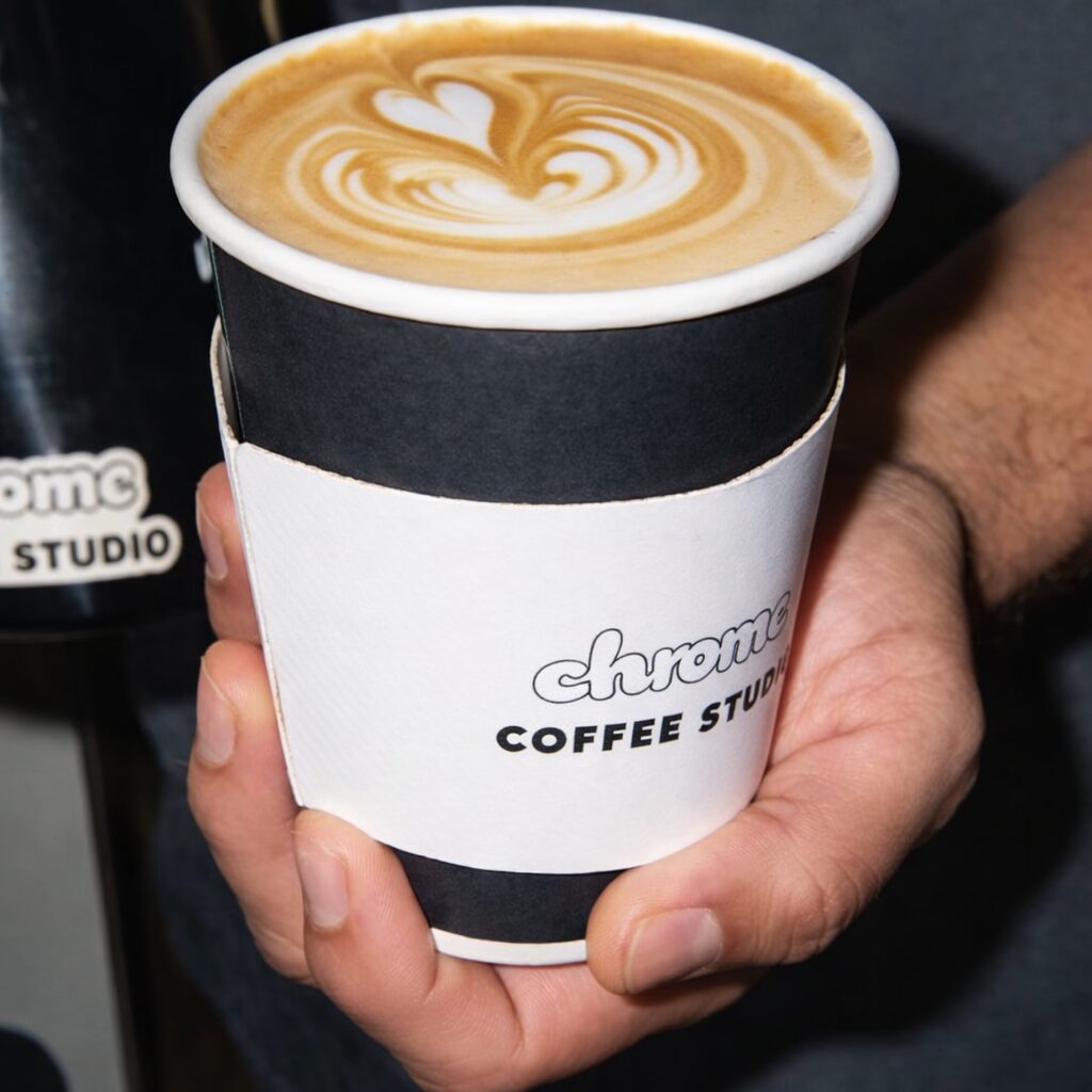 Chrome Coffee Image of man holding coffee