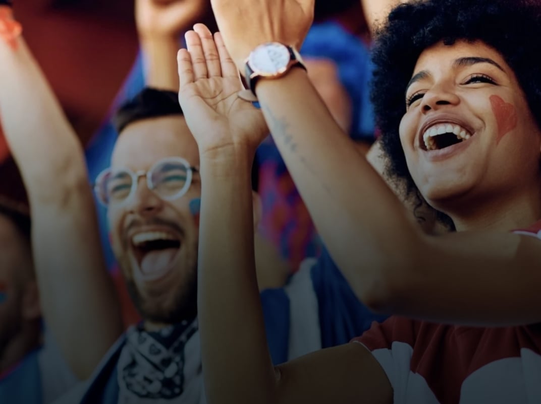 Couple cheering at an event