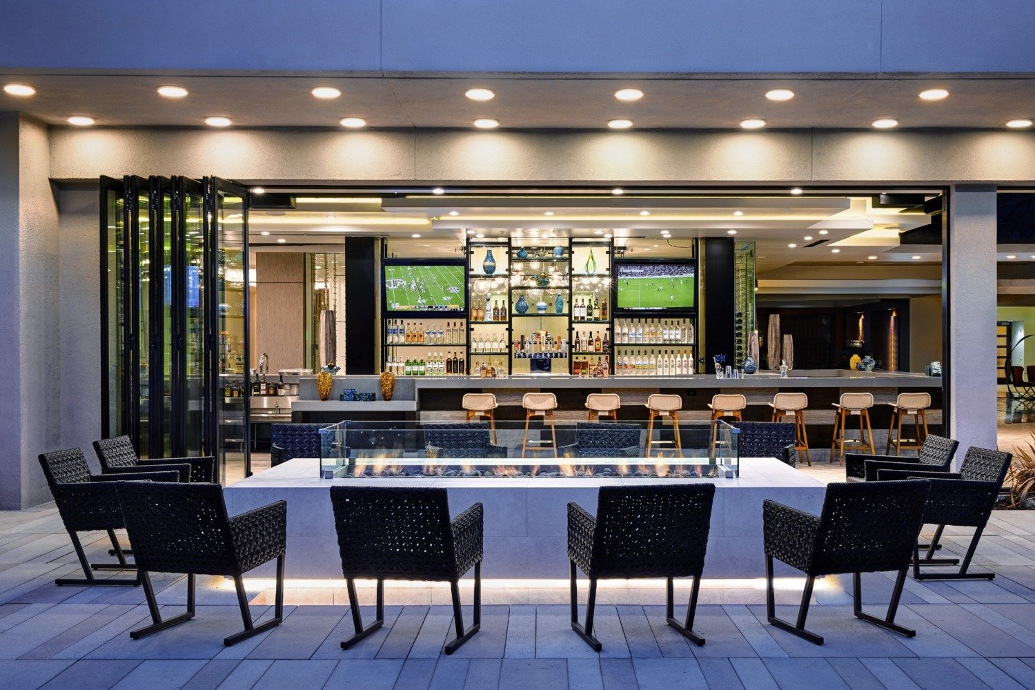 Marriott outdoor fire pit and bar with TVs
