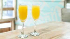 2 mimosas on a table